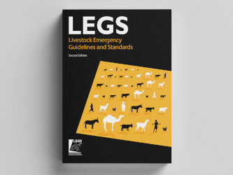 A photo-realistic mock-up of a printed English “Livestock Emergency Guidelines and Standards (LEGS)” handbook.